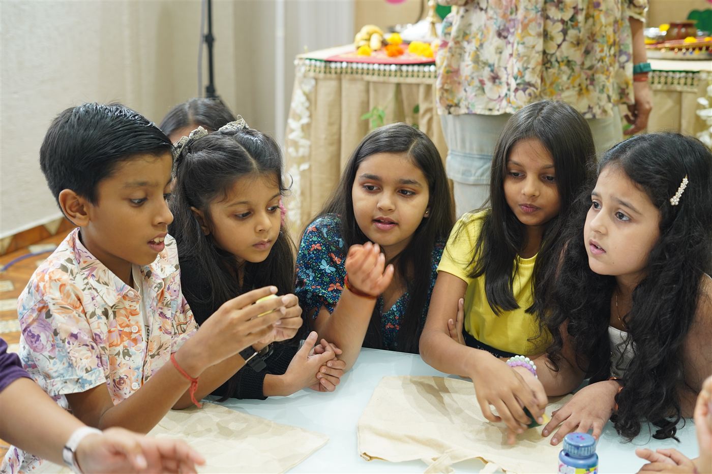 A group of children working together on a design task